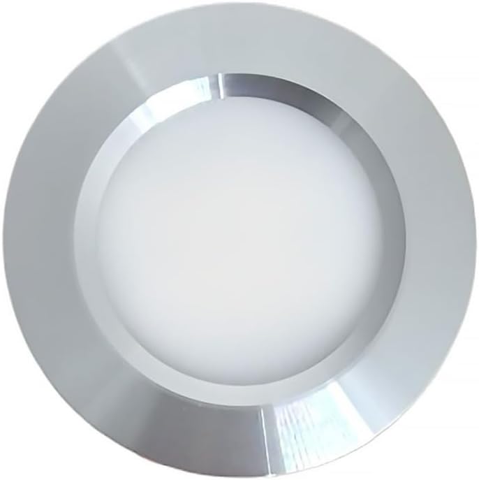 Round metallic object with reflective surface on a white background