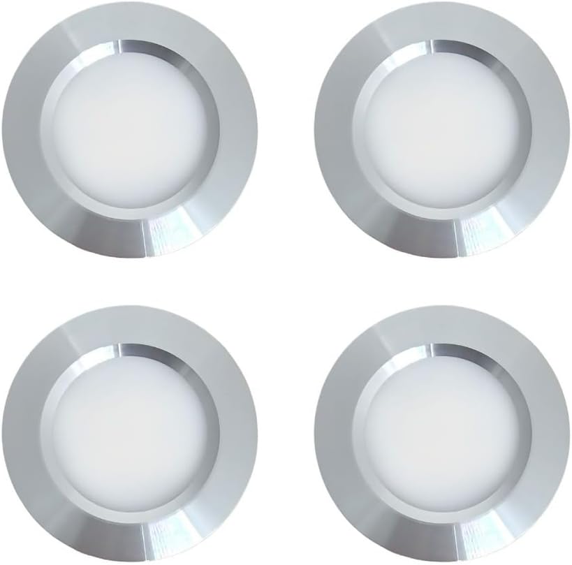 Four silver circular lights on a white background