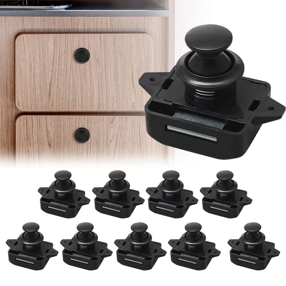 Set of black cabinet door stoppers with a close-up of a cabinet door in the background.