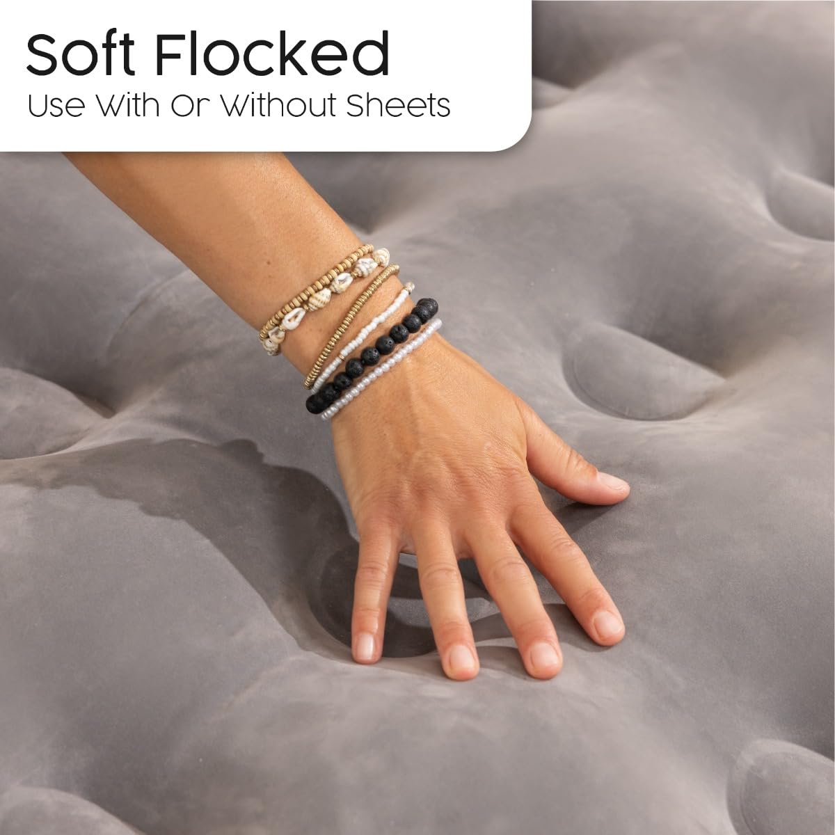 Hand wearing bracelets on a soft flocked surface with text indicating use with or without sheets.