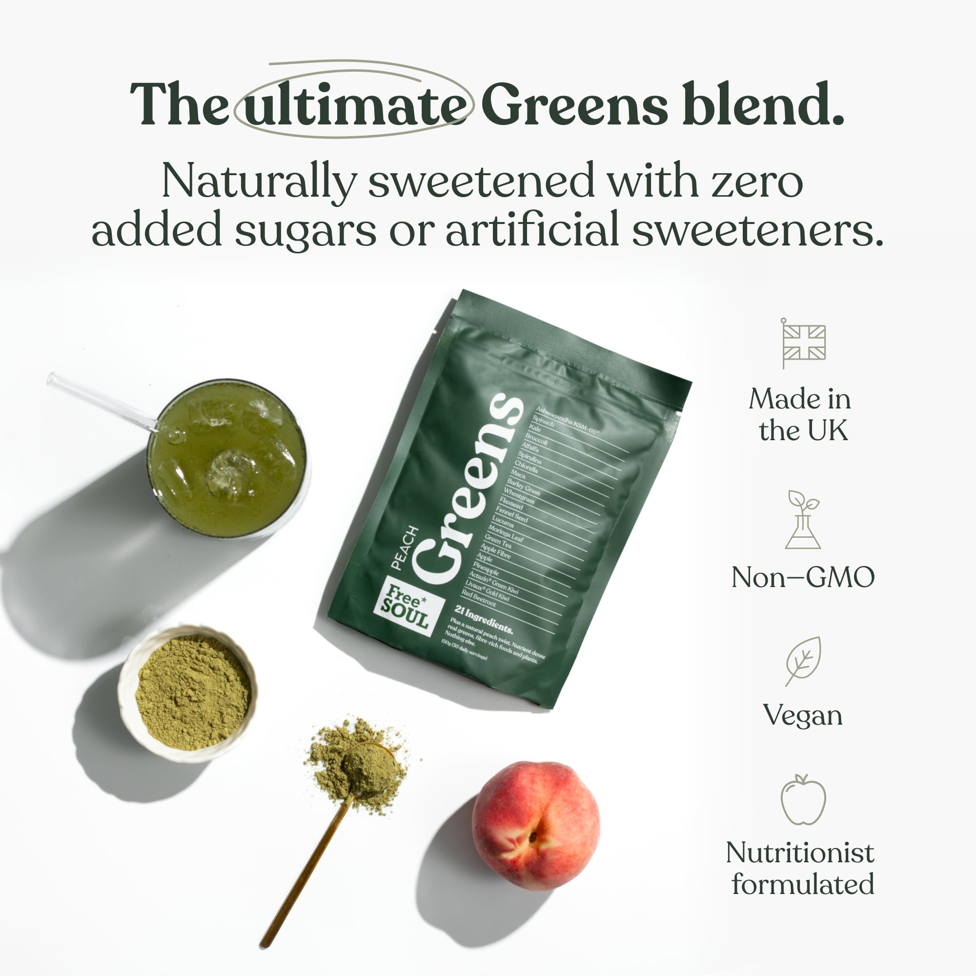 Green packaging of 'Pure Soul' Greens blend with a glass of green juice, peach, and herbs on a white background.