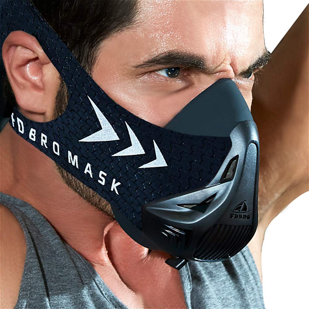 Person wearing a black and gray training mask with 'F дора маск' branding.