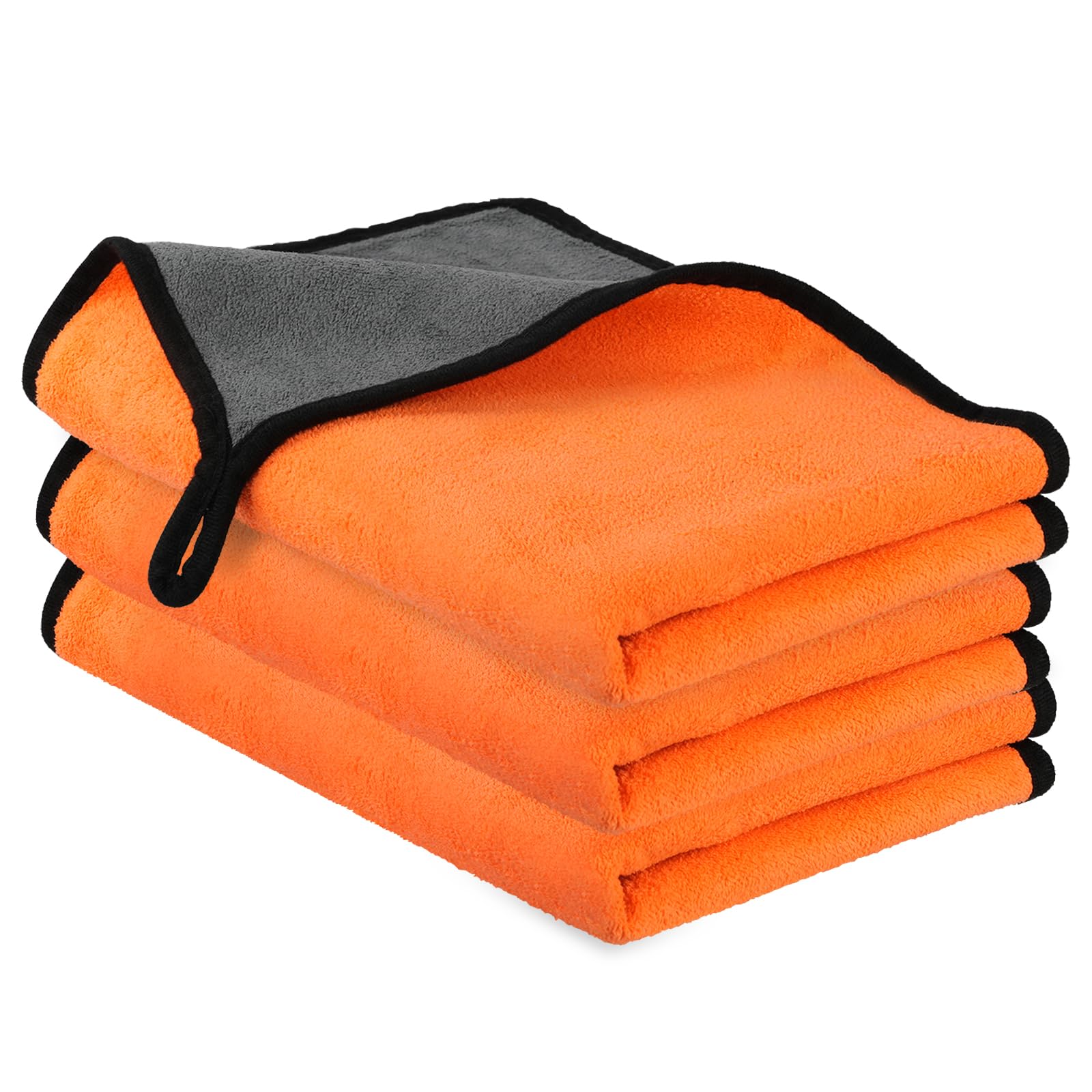 Stack of orange microfiber towels with black edges on a white background