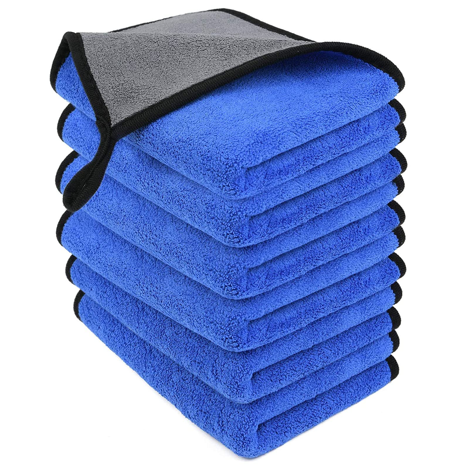 Stack of blue microfiber towels with gray and black edges on a white background