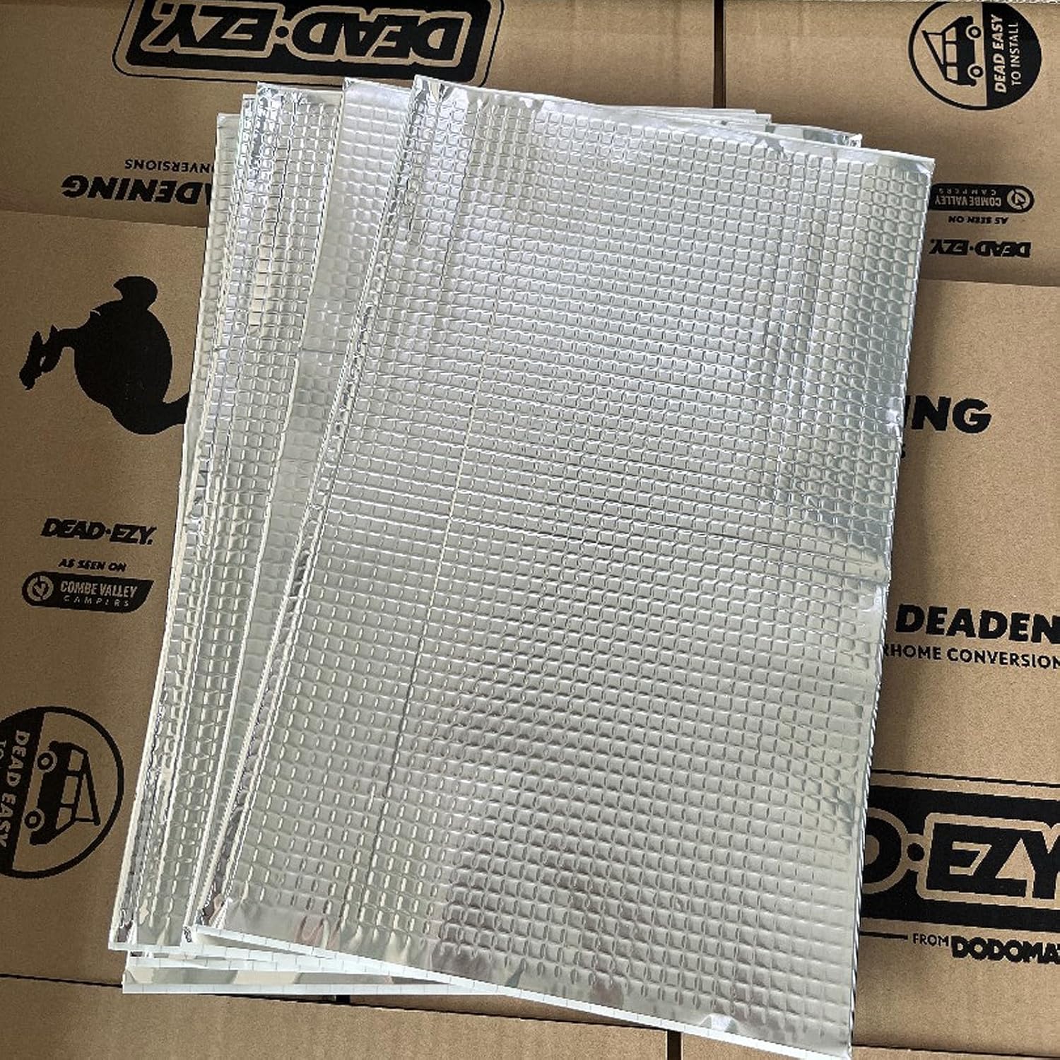 Stack of bubble wrap sheets on a cardboard box with Dead-Ezy branding.