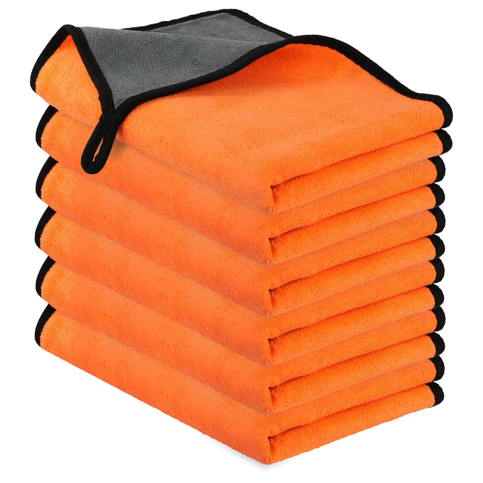 Stack of orange microfiber cloths with a gray top one on a white background