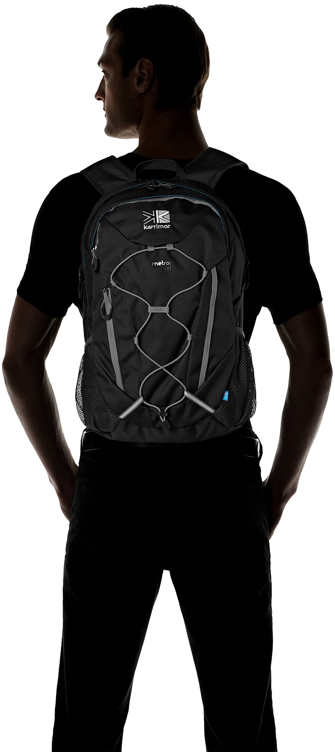 Person wearing a black backpack with visible branding on a white background