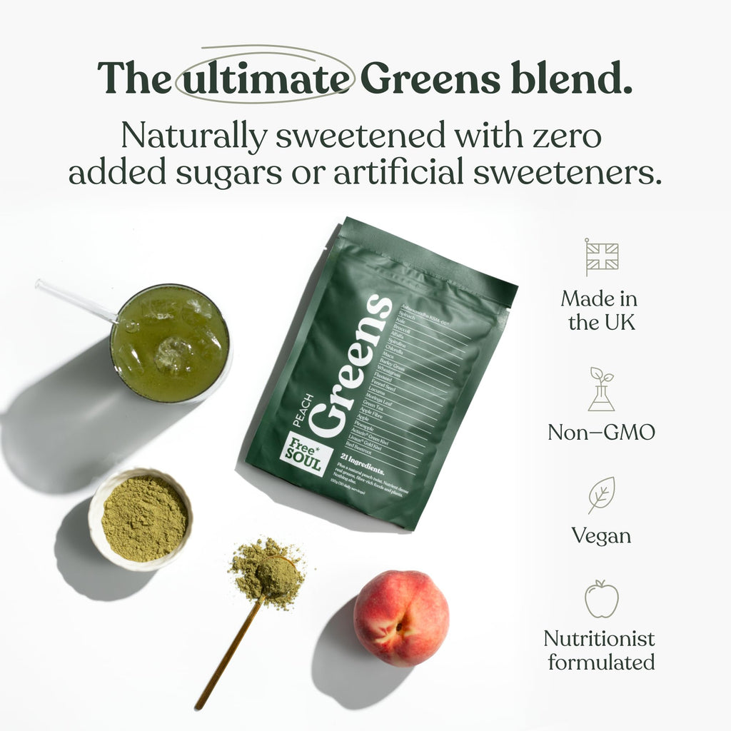 Green packaging of 'Pure Soul' Greens blend with a glass of green juice, peach, and herbs on a white background.