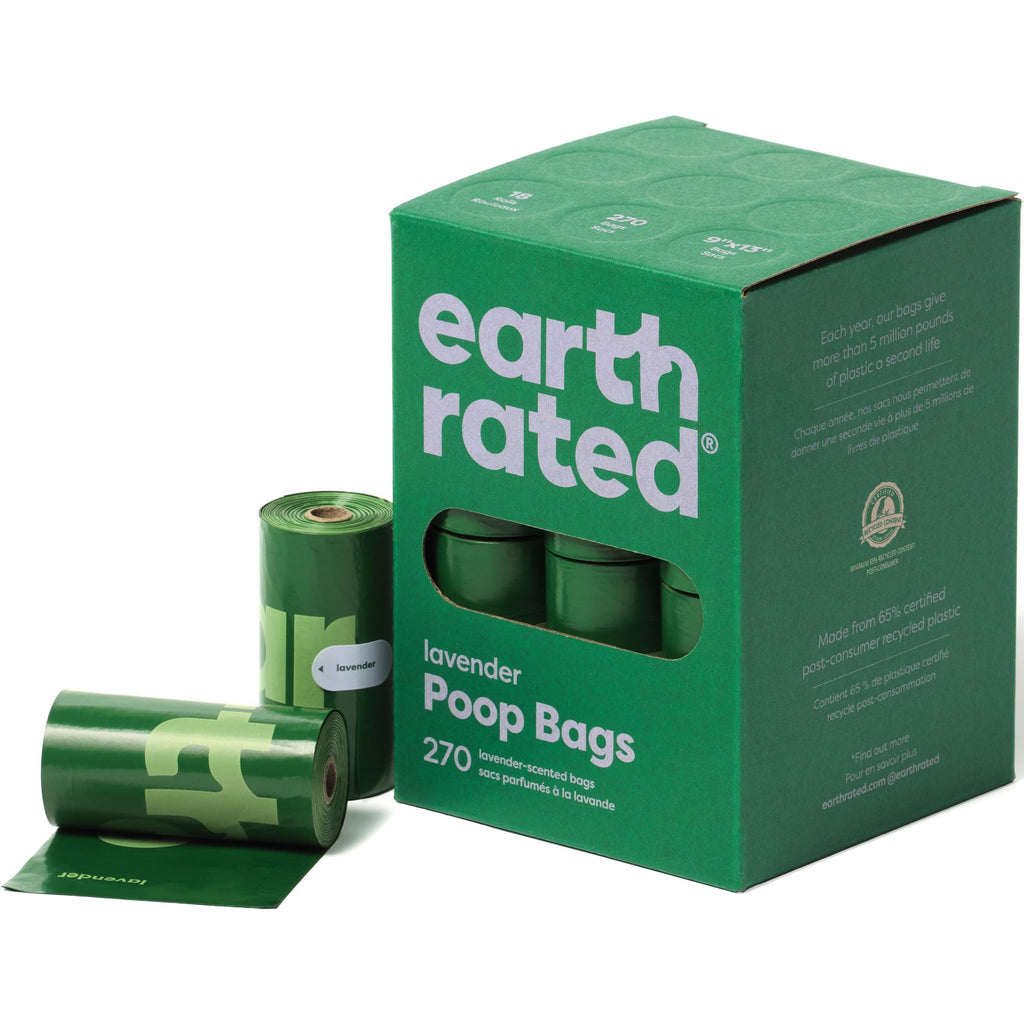 Green 'earth rated' poop bag packaging with a roll of bags on a white background