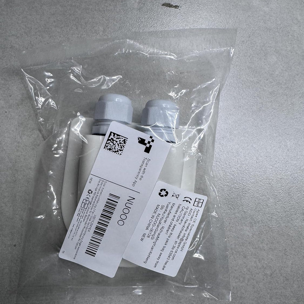 Wiring grommet with labels in a clear plastic bag on a gray surface