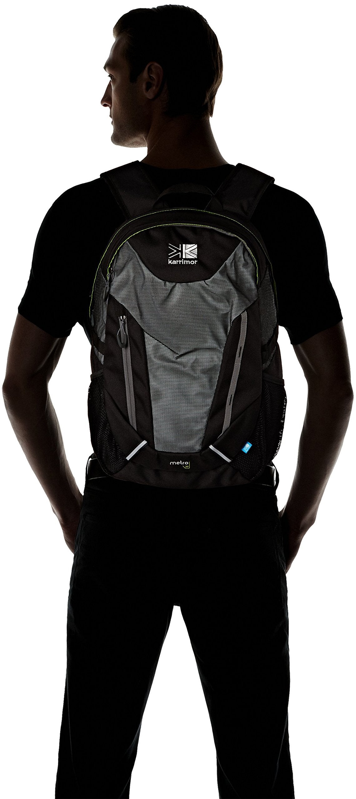 Person wearing a black and gray backpack with a visible brand logo on a white background